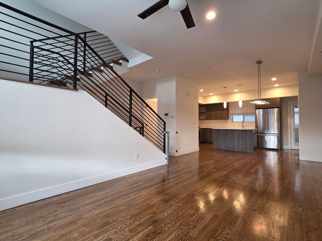 Photo - STUNNING 4-LEVEL TOWNHOME IN HIGHLANDS WITH SAUNA, 2-CAR GARAGE + AMAZING ROOFTOP DECK!