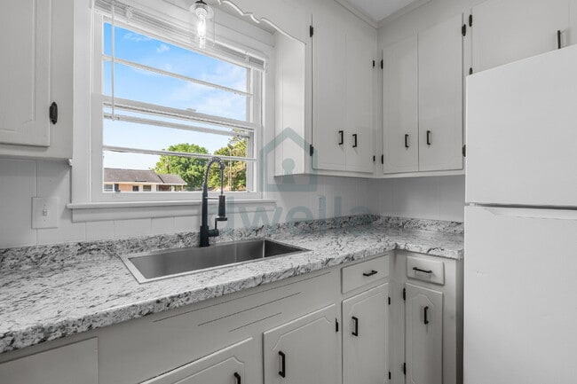 Photo - 3-Bedroom (1.5 Baths) Fully Renovated Rental Home in a PRIME Location! Only 6 minutes to Downtown...