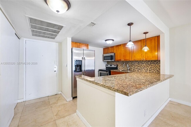 Photo - 601 Three Islands Blvd Unidad 112