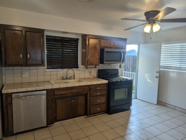 Photo - Move-In Ready 3-Bedroom Home with Solar, Backup Batteries, Covered Patio & Large Yard