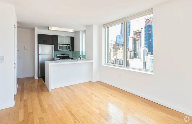 Building Photo - 344 W 37th St Unit 12B Rental