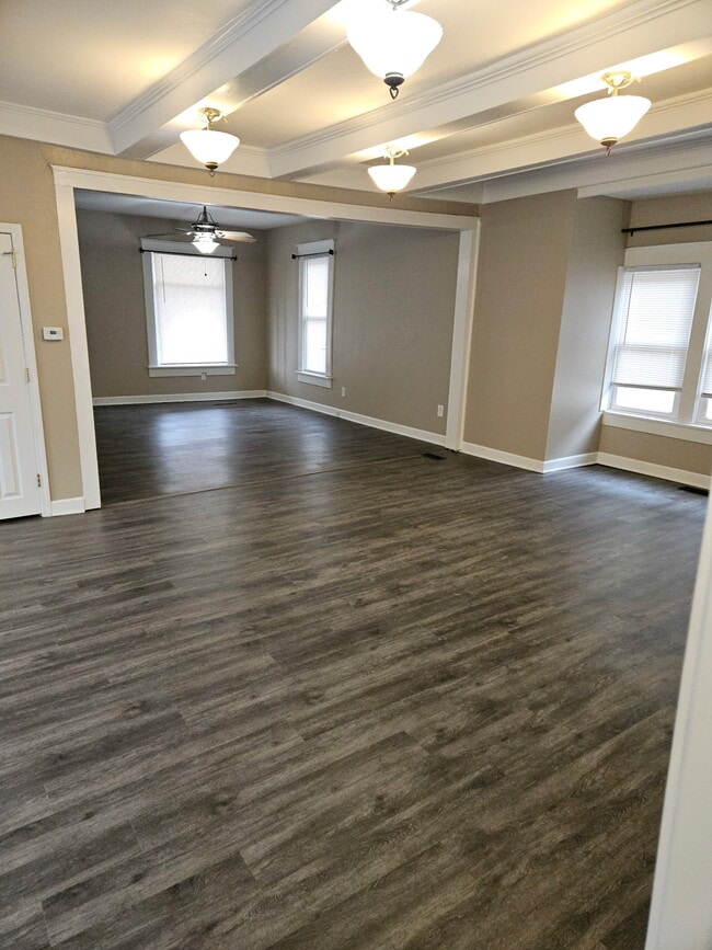 Living flows openly to dining room - 1214 5th Ave