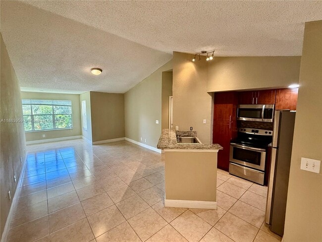 Building Photo - 595 Vista Isles Dr Unit 1923 Rental