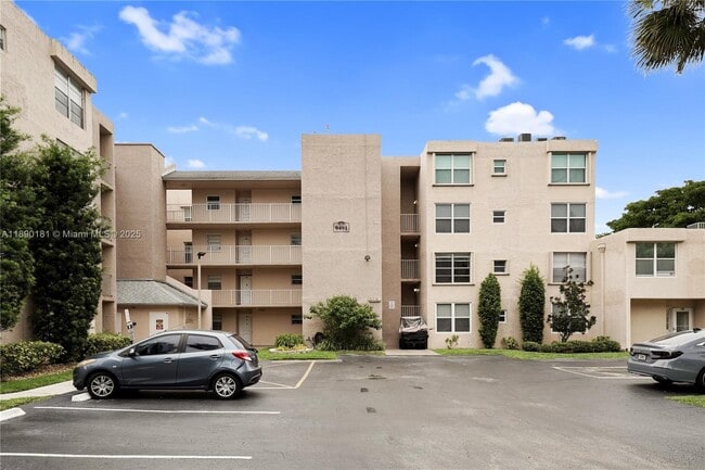 Building Photo - 9491 Evergreen Pl Unit 207