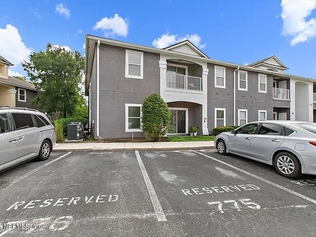 Building Photo - 7920 Merrill Rd Unit 915