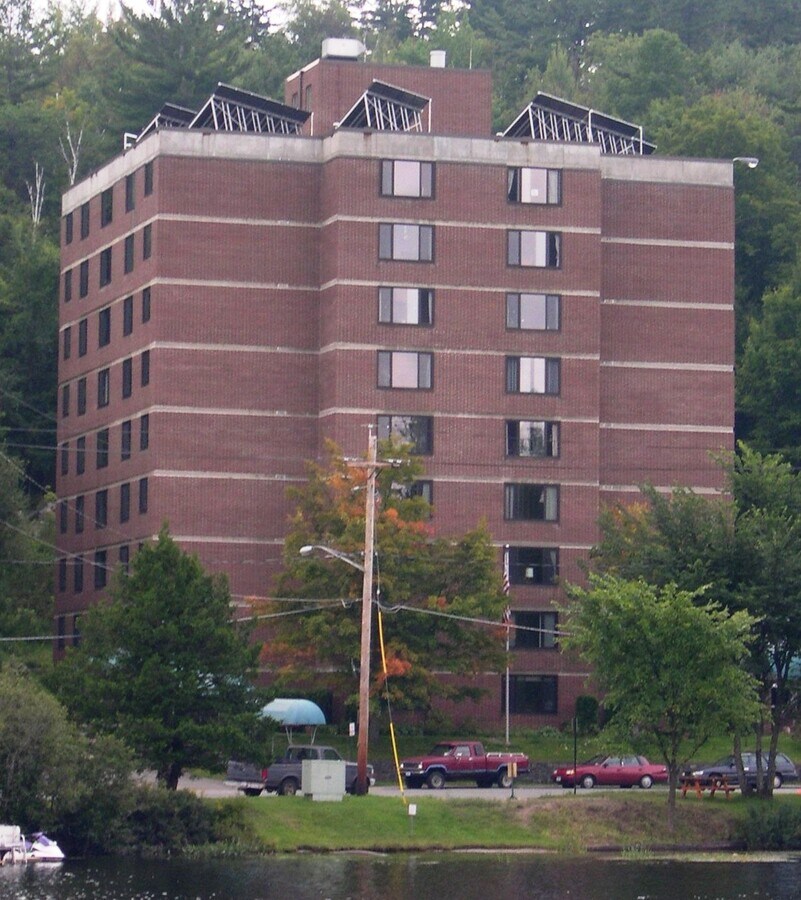 View from across Lake Oseetah - Lake Flower Apartments