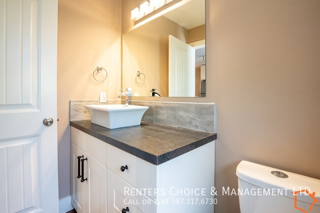 Photo - 2 bedroom Duplex, Onsite laundry, Assigned Parking