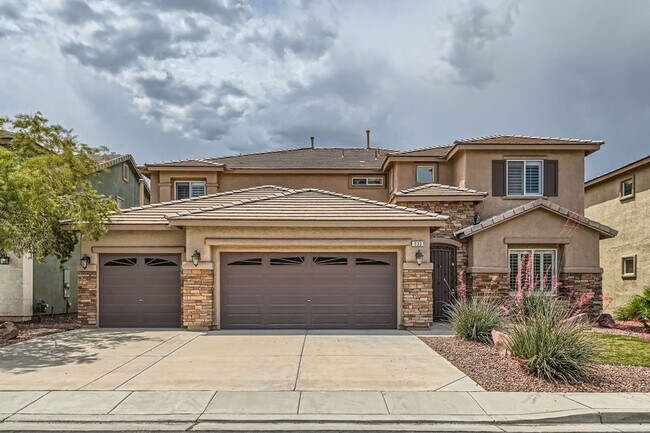 Photo - Gorgeous 5 bd, 3 1/2 bath, 3 car in gated community with strip and mountain views!