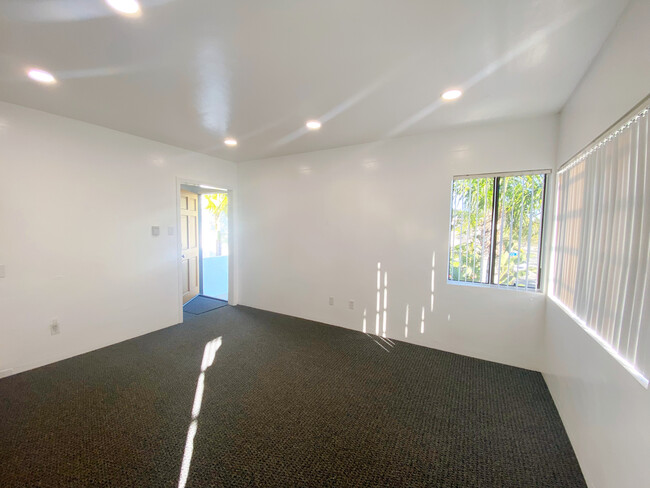 Upgraded living room - 5819 E Ocean Blvd Apartments Unit 5819 E. Ocean Blvd.