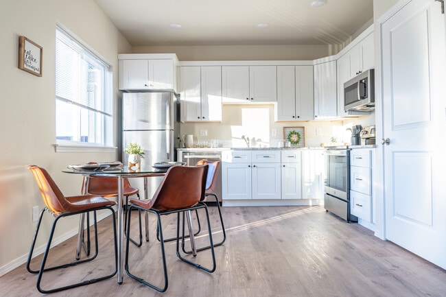 Kitchen with Stainless Steel Appliances - Skyline Apartments