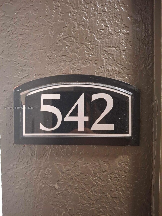 Building Photo - 6001 SW 70th St Unit 542