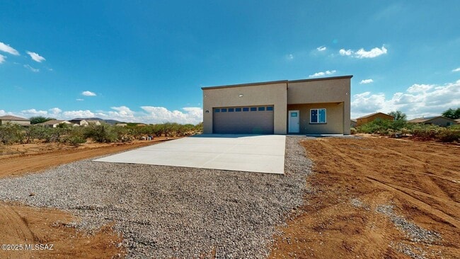 Building Photo - 7095 W Los Reales Rd
