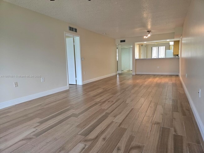 Building Photo - 2701 Village Blvd Unit 102