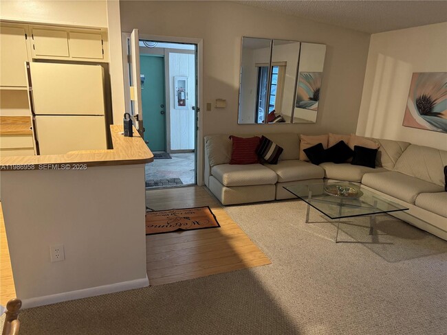 Building Photo - 10419 E Clairmont Cir Unit 205