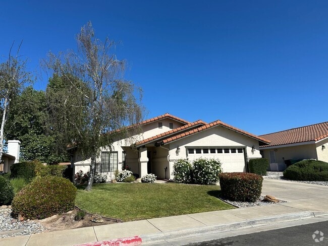 Building Photo - Just reduced! Well cared for home on the g...