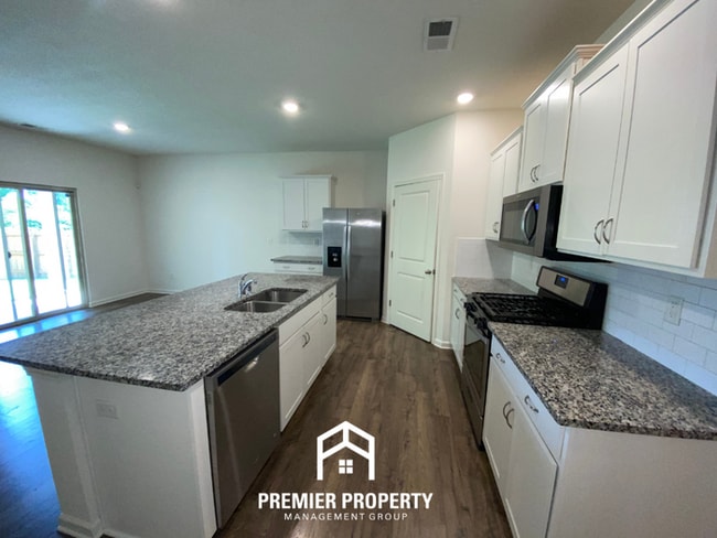 Photo - Modern 4BR/2BA Millington Home | Gourmet Island Kitchen & Luxury Primary Suite
