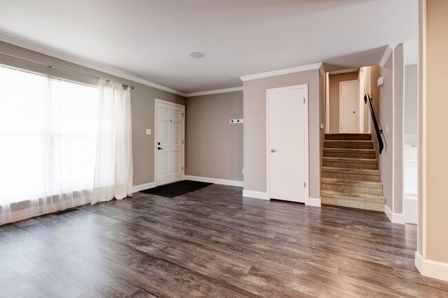 Photo - Spacious 4-Bedroom Home with Private Backyard and Solar Savings – Prime Location!