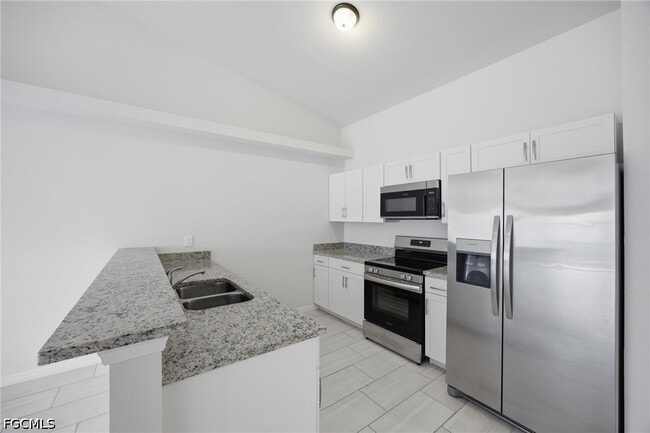 Building Photo - 1426-1428 Cape Coral Pkwy W
