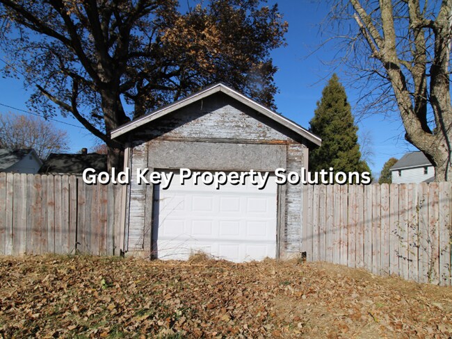 Photo - 2 BR 1 BA House with Fenced Backyard, Basement, and Garage NO SECTION 8