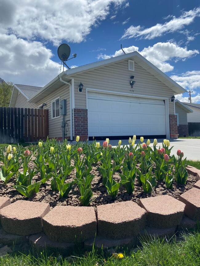 Photo - 3 Bed - 2.5 Bath, Beautiful Home in Ogden - Fully Fenced Yard! - Available on June 10th!
