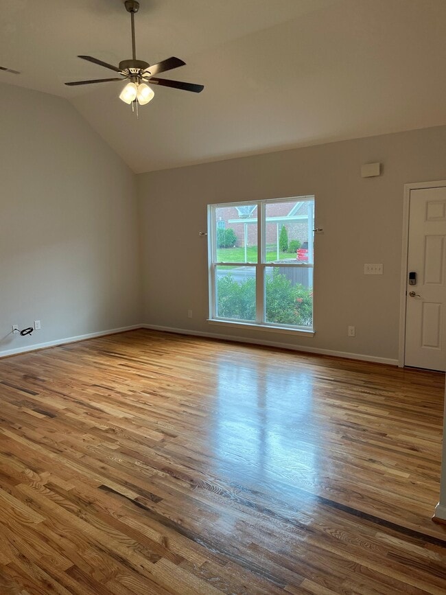 Building Photo - "Charming 2-Bed, 2-Bath Condo with Gleamin...