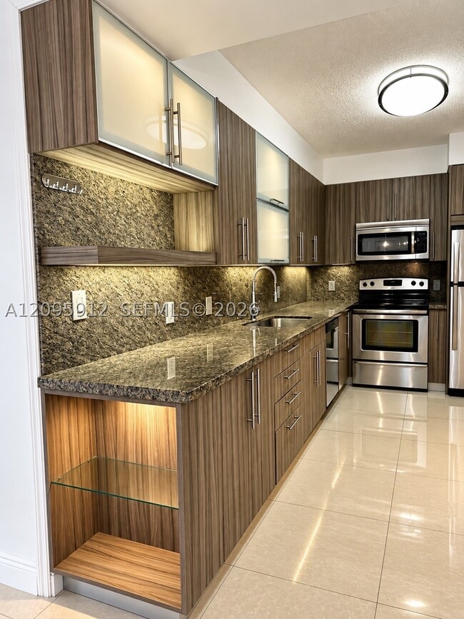 Building Photo - 10185 Collins Ave Unit 203