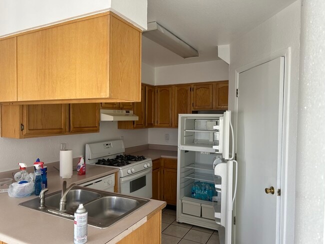 Kitchen with refrig, stove and dishwasher - 1345 Trudy Elaine Dr Unit A