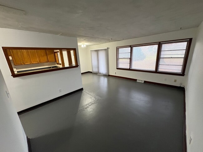 Photo - Lovely & Spacious 4-Bed, 2-Bath Single-Family Home Near Everything You Need