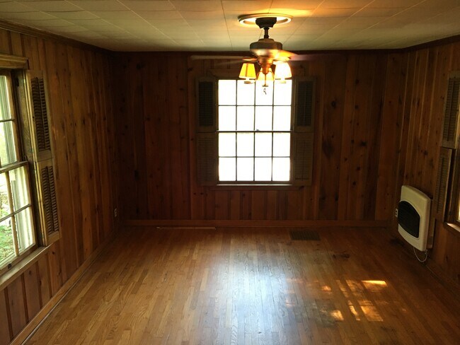 Bedroom Main Floor. Room has personal entrance, gas heater and window air conditioner.