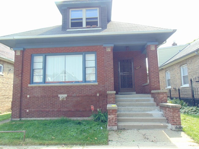 Building Photo - 7637 S Eberhart Ave