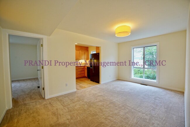 Photo - Wood burning fireplace in this updated 2 b... Unit Apt 2