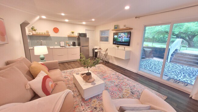 Living room with Sliding doors to private patio.. - 122 Phillips Cir Unit The Flat at Phillips