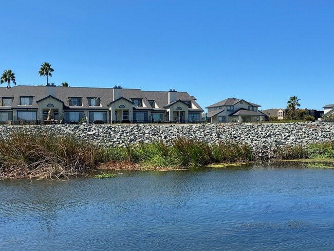 Building Photo - Fabulous Waterfront Condo with Private Boa...