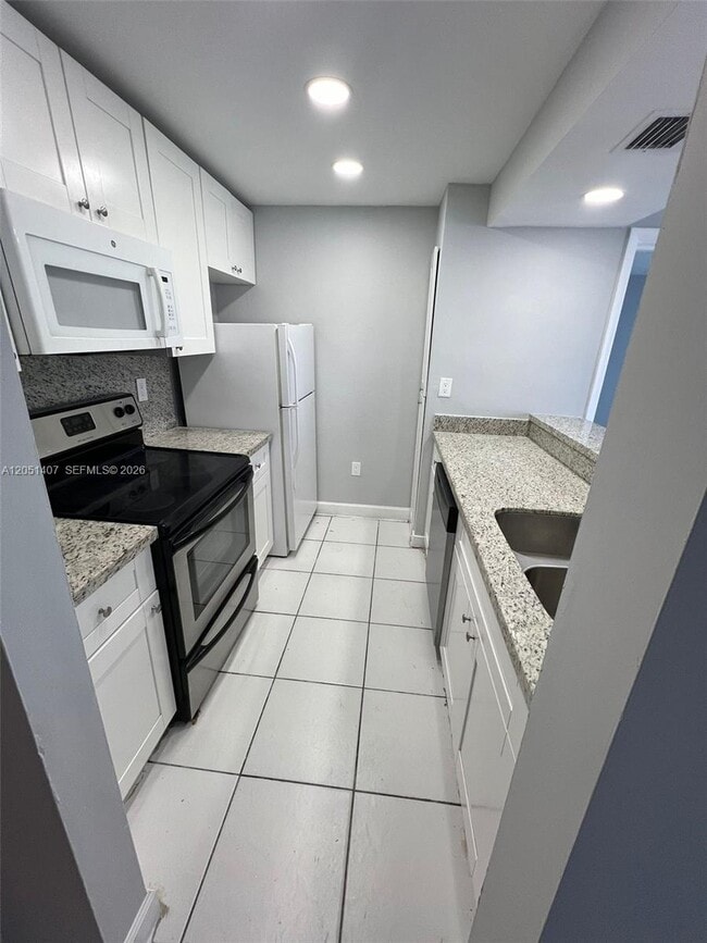 Building Photo - 7035 NW 186th St Unit D509