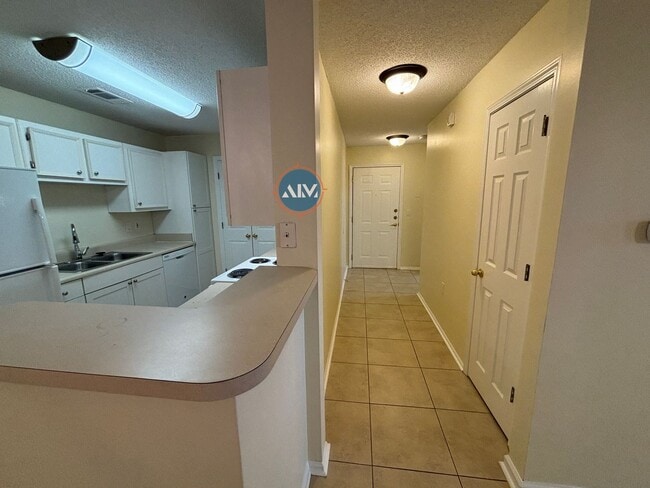 Photo - Spacious 3-Bedroom Villa in Woodbridge – Tile Flooring, Laundry Room, and Prime Bluffton Location!
