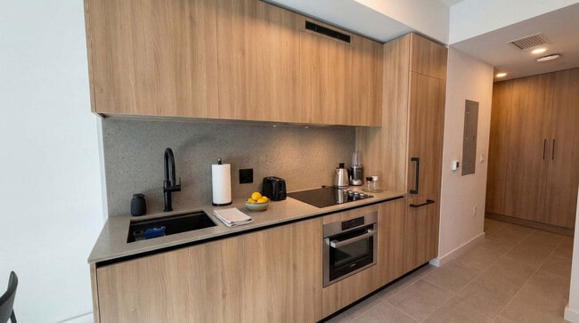 Photo - 121 NE 5th St Unidad SI FL31-ID1499077P