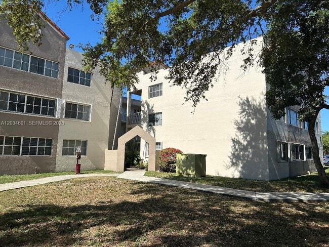 Building Photo - 6175 NW 186th St Unit 110