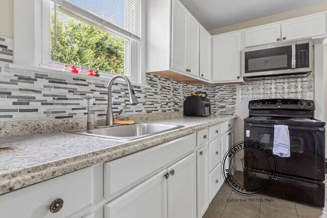 Photo - "Charming 3-Bedroom Home with Spacious Interiors in Norfolk's Heart!"