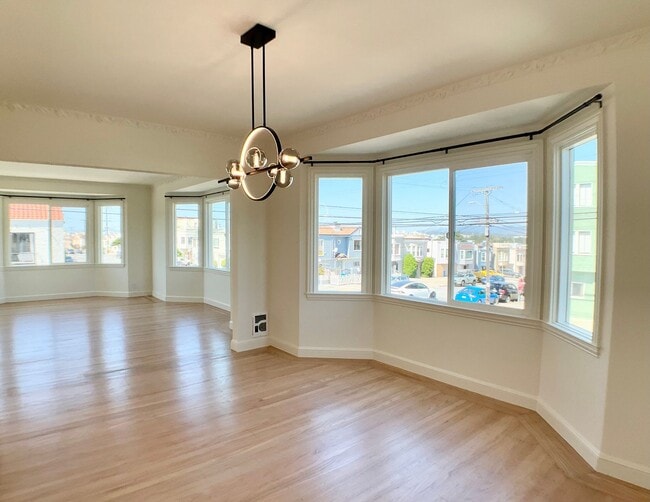 Building Photo - Remodeled! GARAGE PARKING Included! IN-UNI... Unit 1504 Rental