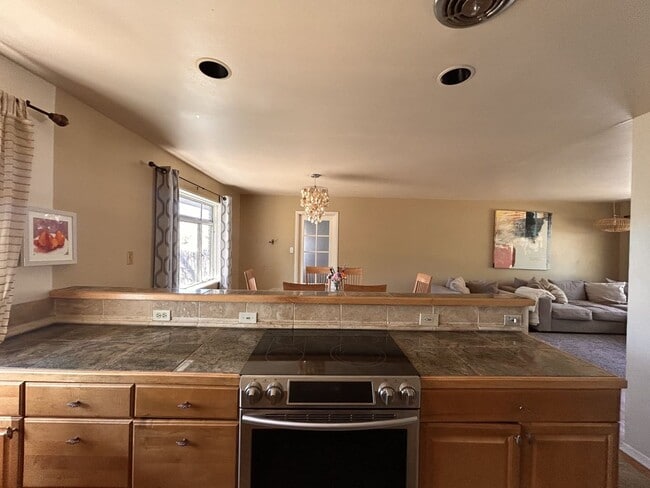 Photo - Enjoy Amazing Flatiron Views, Abundant Space, and A Large Backyard in this 5 Bedroom Home