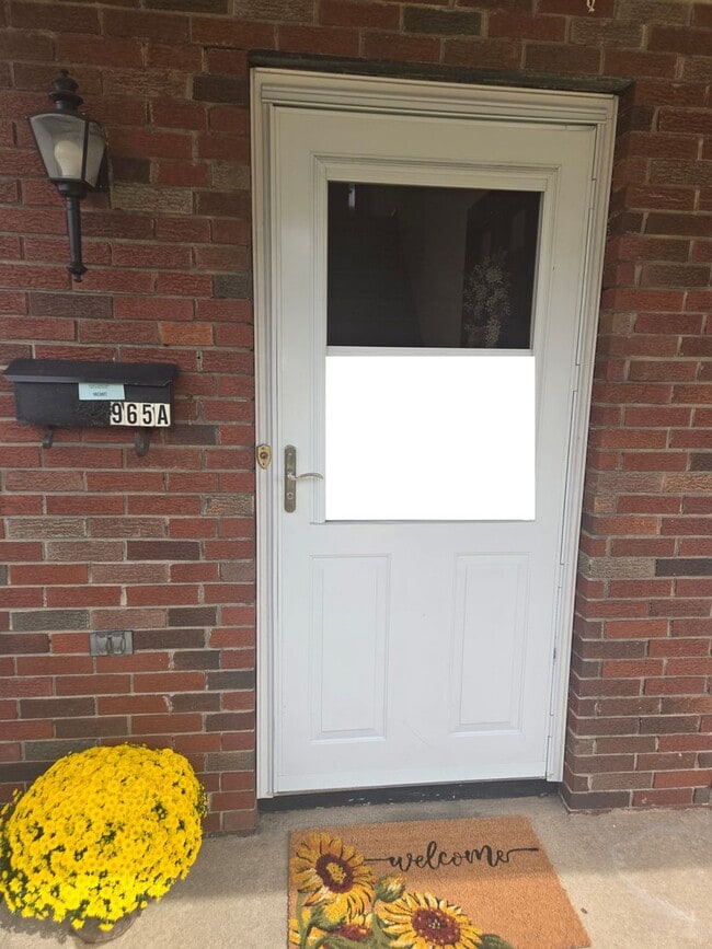 Photo - Updates abound at this SPACIOUS, half dupl...