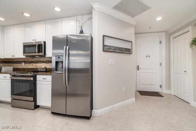 Building Photo - 5793 Cape Harbour Dr Unit 1318 Rental