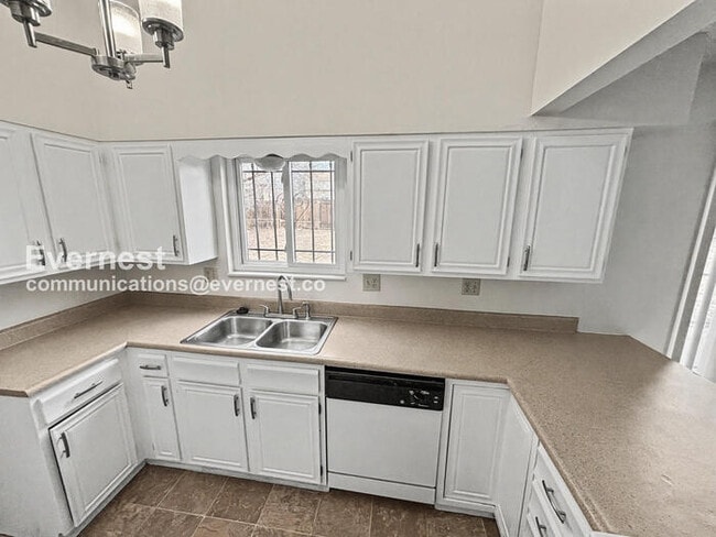 Photo - 5 Bed, 2.5 Bath Home with Fenced Yard & Garage / Available Soon!