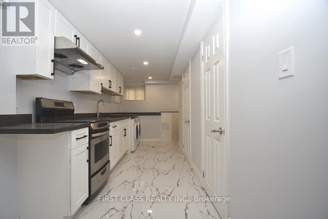 Photo - 133 Coxwell Ave