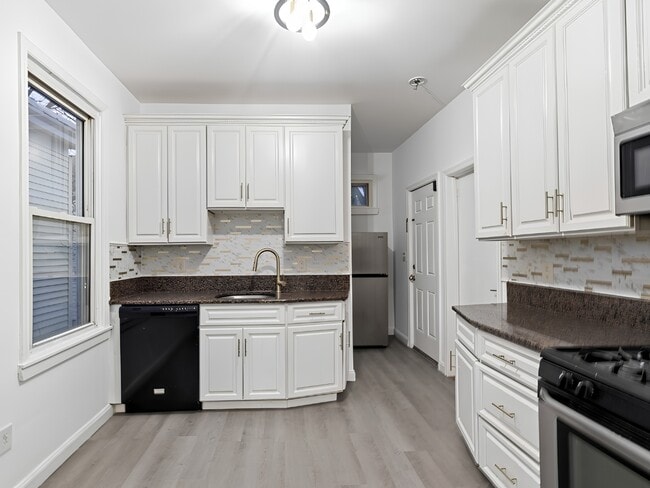 Kitchen with Appliances - 22 Harrison Ave Unit 2