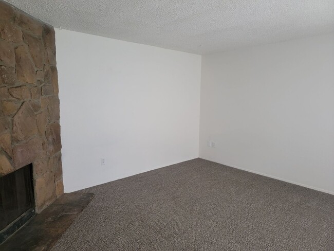 Photo - Spacious Spanaway rambler with covered patio and fenced yard.