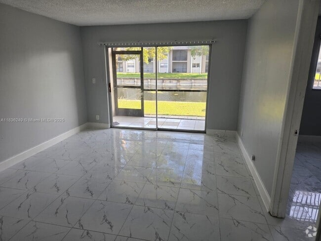 Building Photo - 8040 N Colony Cir Unit 103 Rental