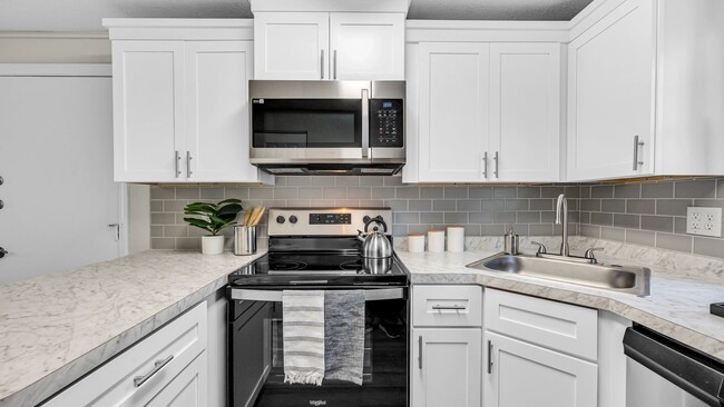 Experience the elegance of stainless steel appliances in all our exemplary kitchens – including dishwashers! - Sugarloaf Estates Apartments