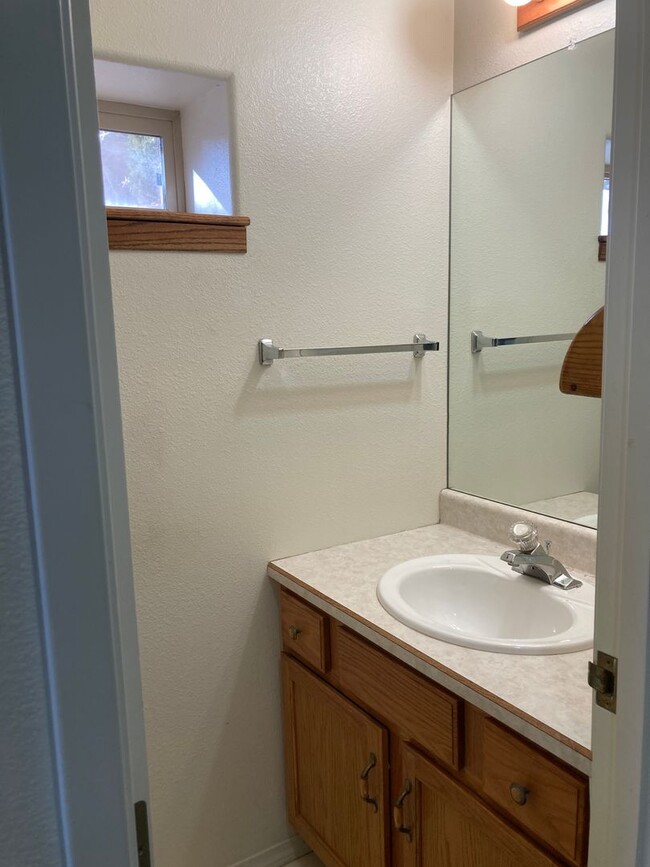 Photo - This spacious 2-bedroom, 1.5-bathroom town... Rental