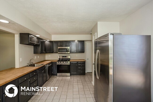 Photo - 9033 E 12th St